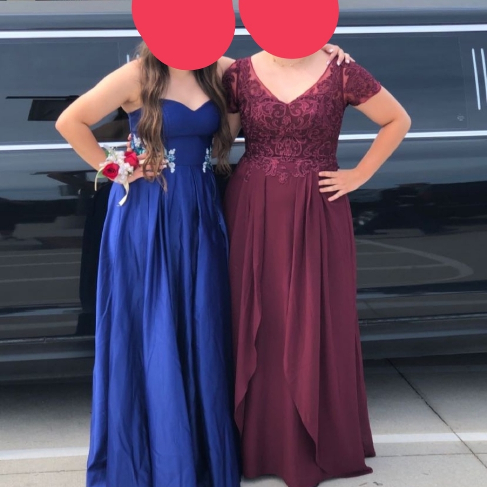 JJs house dress size:10. Color is a deep red-purple color.